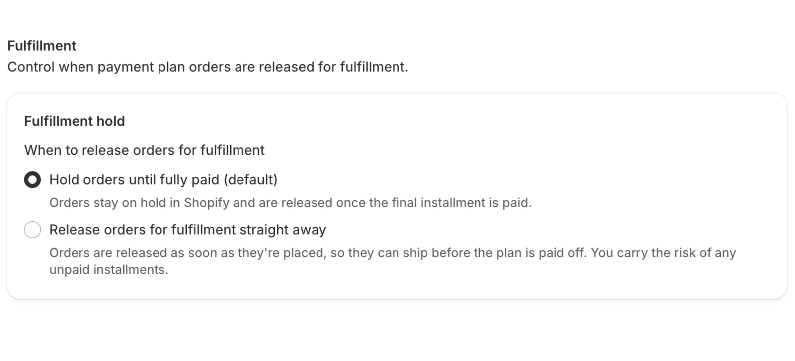 Settings > Fulfillment, with Hold orders until fully paid selected as the default and Release orders for fulfillment straight away as the alternative.